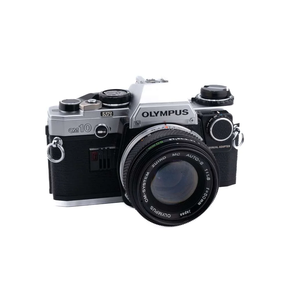 Olympus OM10 SLR 35mm Film Camera with Manual Adapter and 50mm f/1.8 lens